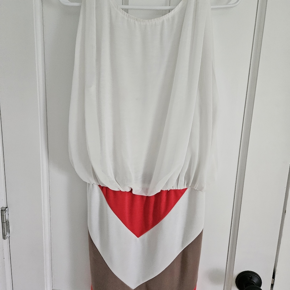 Stretcy multi colored dress. Perfect for going out or on vacation.